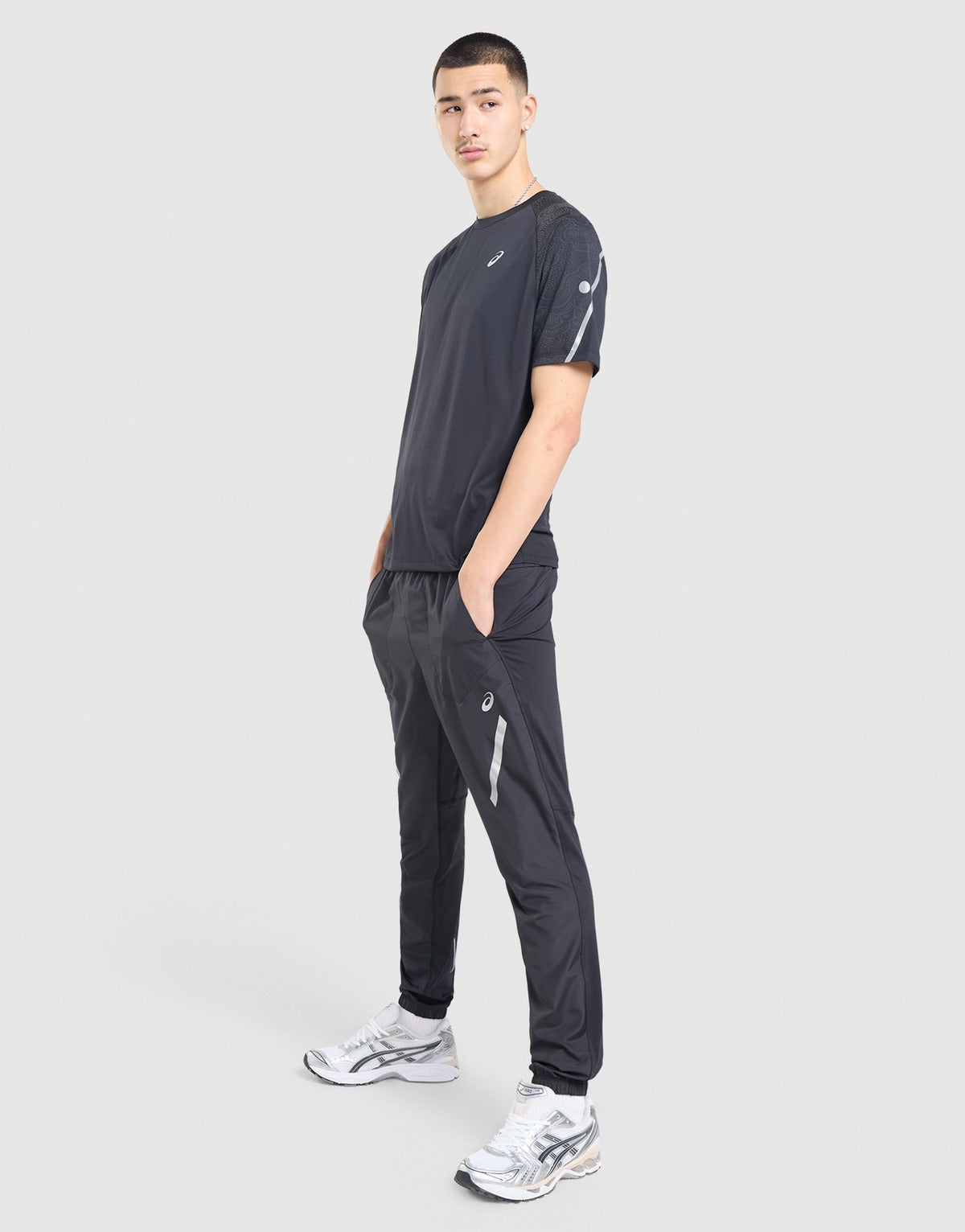 ASICS Pantaloni della tuta LITE-SHOW